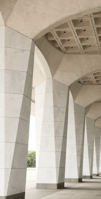 Concrete Calculator UK tool interface displaying multiple shape options including rectangular slabs for patios and driveways, cylindrical columns for pillars and posts, outdoor stairs calculator, foundation footings, and curb gutter sections with instant volume and cost calculations